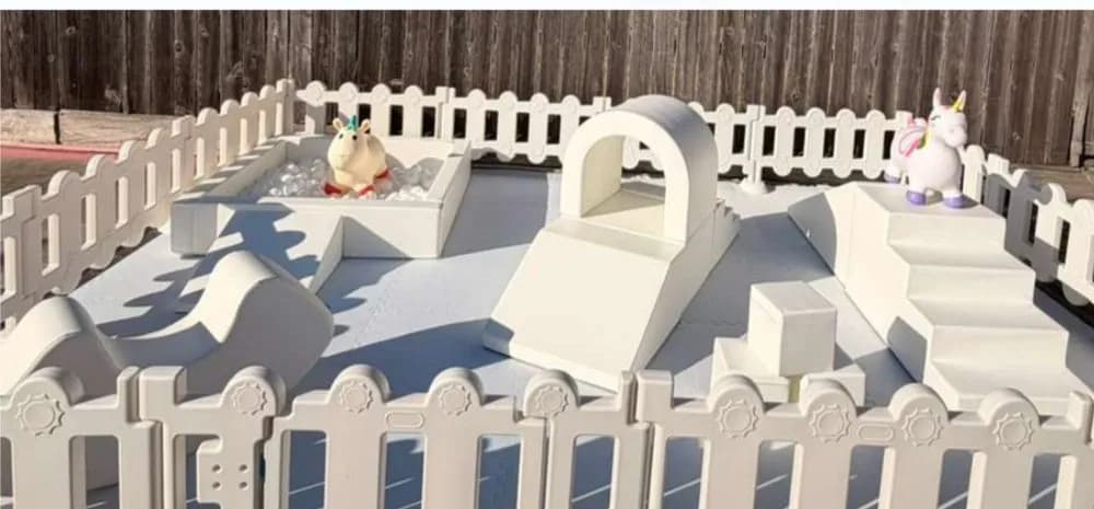 Large gated 12x10 soft play area with tunnel, steps, and ball pit